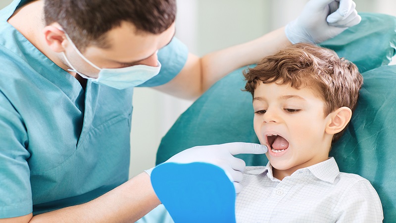 بهترین دندانپزشک کودک اصفهان |  آماده‌سازی روکش دندان کودک